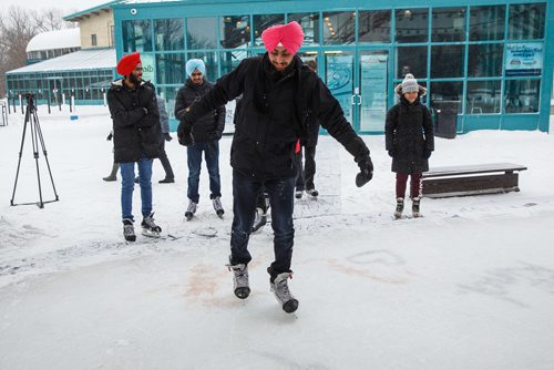 MIKE DEAL / WINNIPEG FREE PRESS
Tanveer Henva tries skating for the first time at The Forks, Friday, February 2, 2018. The Language Training Centre at RRC brought around 30 students who had never skated before to The Forks to give them that essential Canadian experience.
180202 - Friday, February 02, 2018.