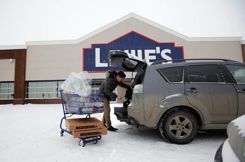 RUTH BONNEVILLE / WINNIPEG FREE PRESS


 JC de Chercq a LG appliance rep,  pushes a shopping cart  with display and marketing items into the new Lowe's store on Kenaston Blvd. Friday.  
Lowe's Grand Opening set for Feb 15th.

Feb 02, 2018
 
