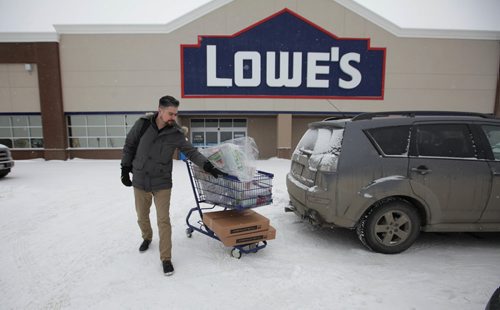 RUTH BONNEVILLE / WINNIPEG FREE PRESS


 JC de Chercq a LG appliance rep,  pushes a shopping cart  with display and marketing items into the new Lowe's store on Kenaston Blvd. Friday.  
Lowe's Grand Opening set for Feb 15th.

Feb 02, 2018
 
