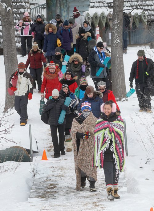 PHIL HOSSACK / Winnipeg Free Press - Dressed for a -22C session, participants in Fort Whyte Alive's Fire and Ice Festival head out onto "Lake 3"  to work on their "Sun Salutes" Saturday morning at the outdoor centre. See Solomon Isreal's story.-  February 3, 2018