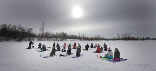 PHIL HOSSACK / Winnipeg Free Press - Dressed for a -22C session, about thirty participants were taking in a session of "ice Yoga on "Lake 3" at the outdoor centre. See Solomon Isreal's story.-  February 3, 2018