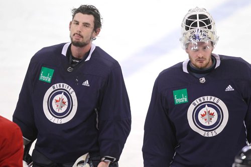 BORIS MINKEVICH / WINNIPEG FREE PRESS
Winnipeg Jets practice at MTS Bell Place. From left, goalie #37 Connor Hellebuyck and goalie #34 Michael Hutchinson. MIKE MCINTYRE STORY Feb. 5, 2018