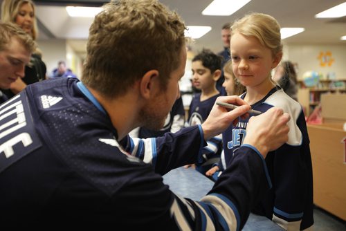RUTH BONNEVILLE / WINNIPEG FREE PRESS


Winnipeg Jets Players Bryan Little (#18) and Tyler Myers (#57) spend some time in the afternoon reading and signing books to grade 2 students from Whyte Ridge Elementary School in conjunction with 'I Love to Read Month', on Monday.  Jets players visited 12 different schools throughout the city reading the official Winnipeg Jets children's storybook "Whiteout: A Winnipeg Jets Story" to classes of students from grades K to 6.

Standup photo 
February 5, 2018.
 
