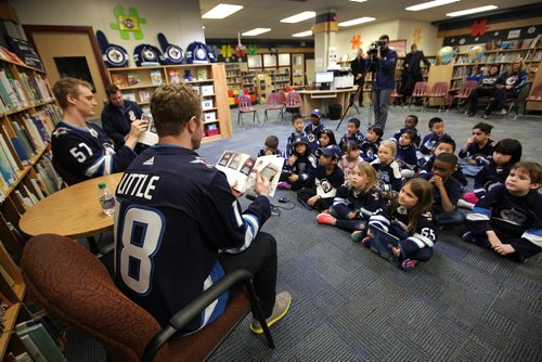 RUTH BONNEVILLE / WINNIPEG FREE PRESS


Winnipeg Jets Players Bryan Little (#18) and Tyler Myers (#57) spend some time in the afternoon reading and signing books to grade 2 students from Whyte Ridge Elementary School in conjunction with 'I Love to Read Month', on Monday.  Jets players visited 12 different schools throughout the city reading the official Winnipeg Jets children's storybook "Whiteout: A Winnipeg Jets Story" to classes of students from grades K to 6.

Standup photo 
February 5, 2018.
 
