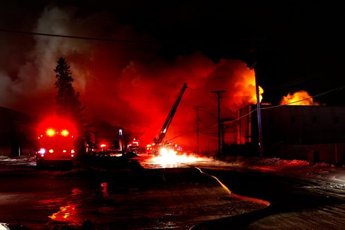JOHN WOODS / WINNIPEG FREE PRESS
Firefighters fight a fire in a warehouse on Roseberry Monday, February 5, 2018.