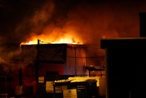 JOHN WOODS / WINNIPEG FREE PRESS
Firefighters fight a fire in a warehouse on Roseberry Monday, February 5, 2018.