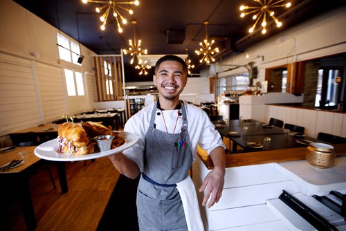 MIKAELA MACKENZIE / WINNIPEG FREE PRESS
Chef Lance Magnaye holds up a catfish po boy sandwich at Ward 1 restaurant on Osborne st. in Winnipeg, Manitoba on Tuesday, Feb. 6, 2018. 
180206 - Tuesday, February 06, 2018.