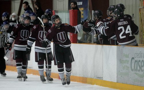 PHIL HOSSACK / Winnipeg Free Press - Westwood Warrior's #71 Tanner Muligan leads his line past the bench celebrating his game winning goal against College Jeanne Sauve Tuesday afternoon at the Dakota Community Centre. The Warriors won 4-3.with Mulligan's third period contribution.  -  February 6, 2018