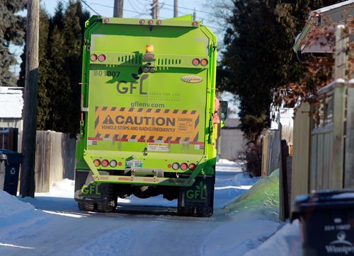 BORIS MINKEVICH / WINNIPEG FREE PRESS
GFL truck working in Bright Oaks area in south Winnipeg.  Feb. 7, 2018