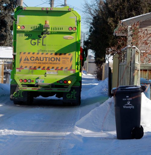 BORIS MINKEVICH / WINNIPEG FREE PRESS
GFL truck working in Bright Oaks area in south Winnipeg.  Feb. 7, 2018