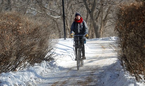 PHIL HOSSACK / Winnipeg Free Press - Dan Reihl cycles through downtown on a classic reclaimed Dutch Cycle Wednesday afternoon. See Jessica's stories re Snow CLearing and Bike to Work Day -  February 7, 2018