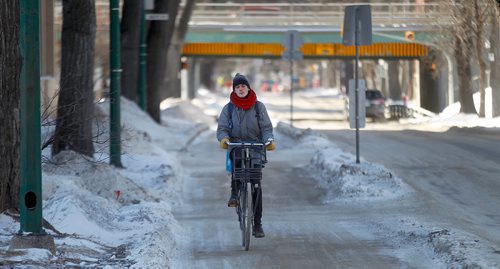 PHIL HOSSACK / Winnipeg Free Press - Dan Reihl cycles through downtown on a classic reclaimed Dutch Cycle Wednesday afternoon. See Jessica's stories re Snow CLearing and Bike to Work Day -  February 7, 2018