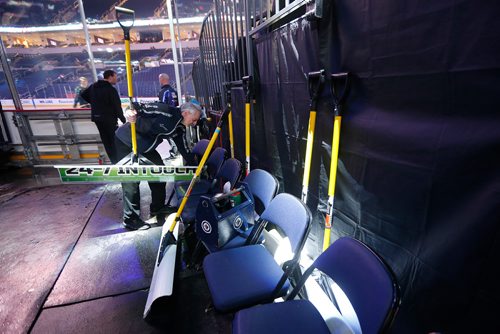 JOHN WOODS / WINNIPEG FREE PRESS
Kevin Cameron, member of the Ice Crew, get shovels organized for the skaters before first period NHL action between the Winnipeg Jets vs Arizona Coyotes in Winnipeg on Tuesday, February 6, 2018.