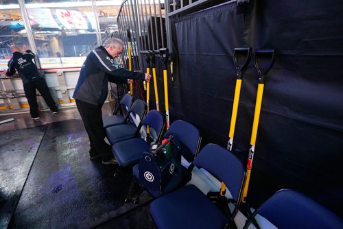 JOHN WOODS / WINNIPEG FREE PRESS
Kevin Cameron, member of the Ice Crew, get shovels organized for the skaters before first period NHL action between the Winnipeg Jets vs Arizona Coyotes in Winnipeg on Tuesday, February 6, 2018.