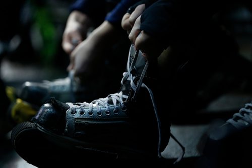 JOHN WOODS / WINNIPEG FREE PRESS
Members of the Ice Crew lace up before first period NHL action between the Winnipeg Jets vs Arizona Coyotes in Winnipeg on Tuesday, February 6, 2018.
