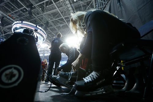 JOHN WOODS / WINNIPEG FREE PRESS
Members of the Ice Crew lace up before first period NHL action between the Winnipeg Jets vs Arizona Coyotes in Winnipeg on Tuesday, February 6, 2018.
