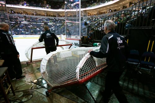 JOHN WOODS / WINNIPEG FREE PRESS
Paul Lazarenko and Kevin Cameron, members of the Ice Crew, move the game goals onto the ice prior to first period NHL action between the Winnipeg Jets vs Arizona Coyotes in Winnipeg on Tuesday, February 6, 2018.
