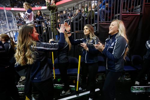 JOHN WOODS / WINNIPEG FREE PRESS
Emily Carey (L), Casey Gall and Jen Derksen, members of the Ice Crew celebrate a Jets goal during first period NHL action between the Winnipeg Jets vs Arizona Coyotes in Winnipeg on Tuesday, February 6, 2018.
