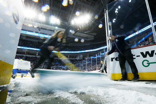 JOHN WOODS / WINNIPEG FREE PRESS
Members of the Ice Crew dump snow as the skate by the entrance during first period NHL action between the Winnipeg Jets vs Arizona Coyotes in Winnipeg on Tuesday, February 6, 2018.