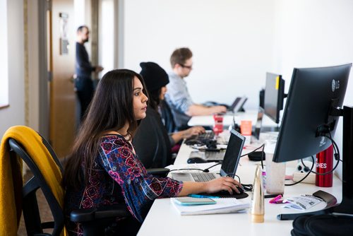 MIKAELA MACKENZIE / WINNIPEG FREE PRESS
Many Khanna, talent recruiter works at the Skip the Dishes headquarters in Winnipeg, Manitoba on Wednesday, Feb. 7, 2018. 
180207 - Wednesday, February 07, 2018.