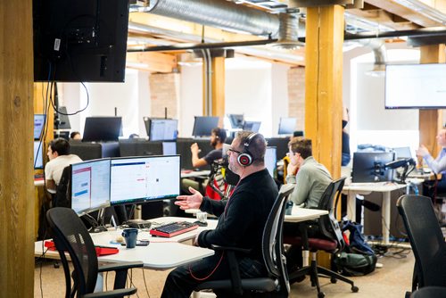 MIKAELA MACKENZIE / WINNIPEG FREE PRESS
Skip the Dishes partnership success specialist Dan Boissonneault works at the headquarters in Winnipeg, Manitoba on Wednesday, Feb. 7, 2018. 
180207 - Wednesday, February 07, 2018.