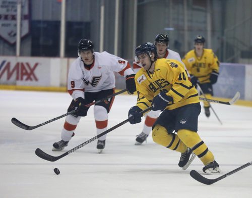 RUTH BONNEVILLE / WINNIPEG FREE PRESS

Winnipeg Blues #10, DALE GOODBRANDSON, works the puck down the ice during the second period of action against the Winkler Flyers at Iceplex Tuesday evening. 

Sports standup
February 7, 2018.
 
