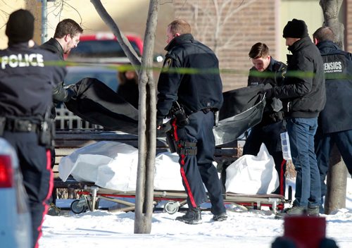 BORIS MINKEVICH / WINNIPEG FREE PRESS
Winnipeg Police Service WPS on scene in the park across the street from the Burton Cummings Theatre where a body was found. Feb. 8, 2018