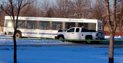 BORIS MINKEVICH / WINNIPEG FREE PRESS
A Winnipeg Transit bus involved in a MVC with a pickup truck at the corner of Warde Ave. and John Forsyth Road. Winnipeg Police Service WPS. Feb. 8, 2018