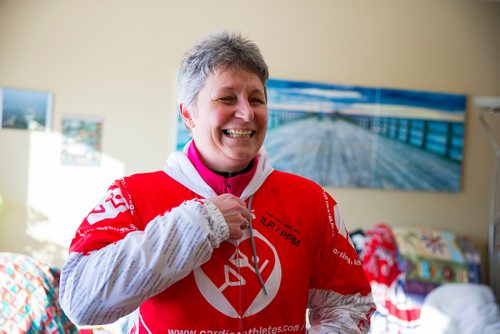 MIKAELA MACKENZIE / WINNIPEG FREE PRESS
Patti LeBlanc, cardiac athlete, gets ready to go out for a run in Winnipeg, Manitoba on Friday, Feb. 9, 2018. LeBlanc had been training for an ultra-marathon at 49 when she suffered a Spontaneous Coronary Artery Dissection. She is now back running, and advocating for women's heart health research and awareness.
180209 - Friday, February 09, 2018.