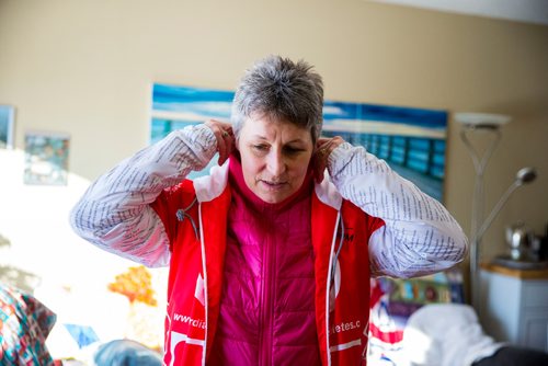 MIKAELA MACKENZIE / WINNIPEG FREE PRESS
Patti LeBlanc, cardiac athlete, gets ready to go out for a run in Winnipeg, Manitoba on Friday, Feb. 9, 2018. LeBlanc had been training for an ultra-marathon at 49 when she suffered a Spontaneous Coronary Artery Dissection. She is now back running, and advocating for women's heart health research and awareness.
180209 - Friday, February 09, 2018.