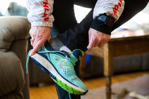 MIKAELA MACKENZIE / WINNIPEG FREE PRESS
Patti LeBlanc, cardiac athlete, gets ready to go out for a run in Winnipeg, Manitoba on Friday, Feb. 9, 2018. LeBlanc had been training for an ultra-marathon at 49 when she suffered a Spontaneous Coronary Artery Dissection. She is now back running, and advocating for women's heart health research and awareness.
180209 - Friday, February 09, 2018.