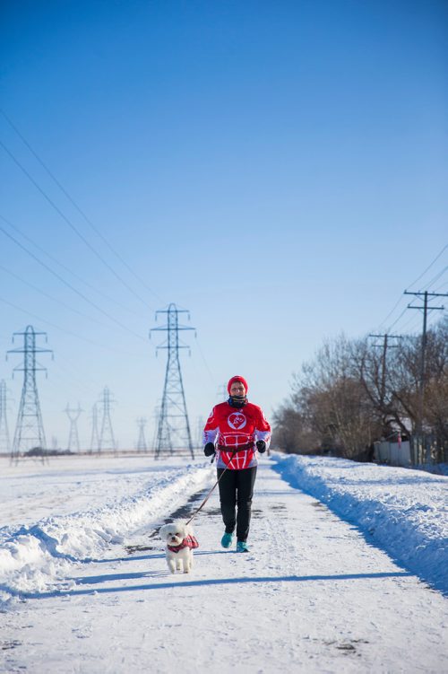 MIKAELA MACKENZIE / WINNIPEG FREE PRESS
Patti LeBlanc, cardiac athlete, trains with her dog, Peter, in Winnipeg, Manitoba on Friday, Feb. 9, 2018. LeBlanc had been training for an ultra-marathon at 49 when she suffered a Spontaneous Coronary Artery Dissection. She is now back running, and advocating for women's heart health research and awareness.
180209 - Friday, February 09, 2018.