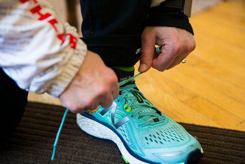 MIKAELA MACKENZIE / WINNIPEG FREE PRESS
Patti LeBlanc, cardiac athlete, gets ready to go out for a run in Winnipeg, Manitoba on Friday, Feb. 9, 2018. LeBlanc had been training for an ultra-marathon at 49 when she suffered a Spontaneous Coronary Artery Dissection. She is now back running, and advocating for women's heart health research and awareness.
180209 - Friday, February 09, 2018.