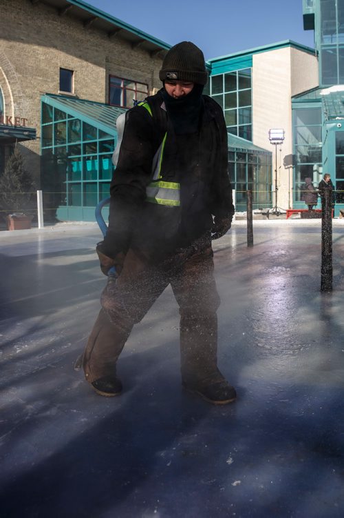 MIKE DEAL / WINNIPEG FREE PRESS
The Crokicurl rink is pebbled prior to the first ever Mayor's Cup Crokicurl Tournaspiel at The Forks Friday afternoon.
180209 - Friday, February 09, 2018.