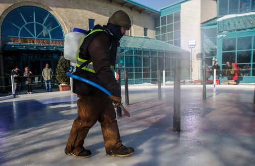 MIKE DEAL / WINNIPEG FREE PRESS
The Crokicurl rink is pebbled prior to the first ever Mayor's Cup Crokicurl Tournaspiel at The Forks Friday afternoon.
180209 - Friday, February 09, 2018.