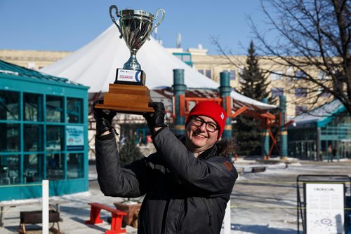 MIKE DEAL / WINNIPEG FREE PRESS
Steinbach Mayor Chris Goertzen hoists the Mayor's Cup after winning the first ever Mayor's Cup Crokicurl Tournaspiel at The Forks Friday afternoon. He played against the mayor's of Winkler, Martin Harder, and Winnipeg, Brian Bowman. Chris Goertzen won the Mayor's Cup after beating Mayor Bowman in a tiebreaker.
180209 - Friday, February 09, 2018.