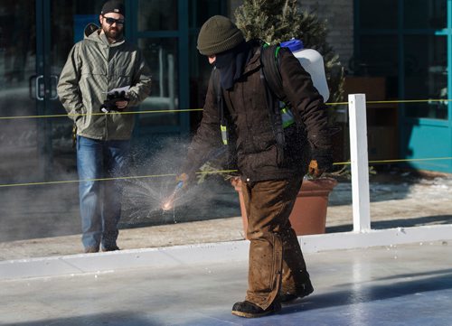 MIKE DEAL / WINNIPEG FREE PRESS
The Crokicurl rink is pebbled prior to the first ever Mayor's Cup Crokicurl Tournaspiel at The Forks Friday afternoon.
180209 - Friday, February 09, 2018.