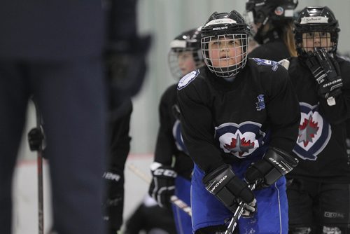RUTH BONNEVILLE / WINNIPEG FREE 

49.8 TNYF feature.  Grade 4/5 students from Crestview School learn to play hockey on ice with Murray Cobb, Director, Winnipeg Jets Hockey Academy and volunteers at Iceplex Tuesday.  Story on the 12th year, the Winnipeg Jets Hockey Academy's  play-based program that is designed to increase school attendance and high school graduation rates, and instill life skills through the game of hockey. 
 Students name - Gus.

See Randy Turner story.
Feb 09/18