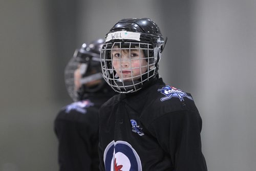 RUTH BONNEVILLE / WINNIPEG FREE 

49.8 TNYF feature.  Grade 4/5 students from Crestview School learn to play hockey on ice with Murray Cobb, Director, Winnipeg Jets Hockey Academy and volunteers at Iceplex Tuesday.  Story on the 12th year, the Winnipeg Jets Hockey Academy's  play-based program that is designed to increase school attendance and high school graduation rates, and instill life skills through the game of hockey. 
 Will on ice with classmates.  

See Randy Turner story.
Feb 09/18