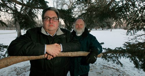 PHIL HOSSACK / Winnipeg Free Press -  Kyle Mason (left) and Very Reverend Paul Johnson pose in St John's Park Friday afternoon. See Jessica's story re: Healing Forest plans for a corner of the park.  -  February 8, 2018