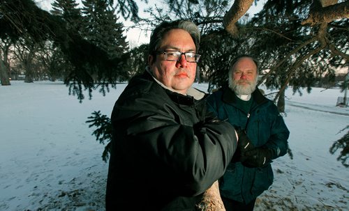 PHIL HOSSACK / Winnipeg Free Press -  Kyle Mason (left) and Very Reverend Paul Johnson pose in St John's Park Friday afternoon. See Jessica's story re: Healing Forest plans for a corner of the park.  -  February 8, 2018