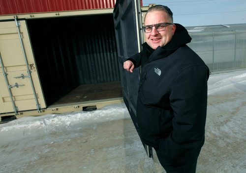 PHIL HOSSACK / Winnipeg Free Press - Mike Millard, a former meth addict now anti drug advocate poses inside a shipping container like the ones he's working to turn into affordable housing built by recovering addicts..... -  February 10, 2018