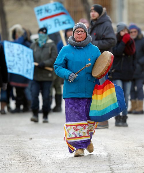 PHIL HOSSACK / Winnipeg Free Press - Drummers lead protestors as they march to and from the Courthouse and the Forks Saturday afternoon. See Alex Paul's story.-  February 10, 2018