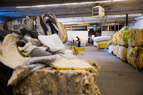 MIKAELA MACKENZIE / WINNIPEG FREE PRESS
Warren Ostifichuk strips down mattresses to recycle the parts at the Mother Earth Recycling centre in Winnipeg, Manitoba on Monday, Feb. 12, 2018. The centre recycles things like electronics and mattresses, but also offers jobs and training to low income people to help get them on their feet.
180212 - Monday, February 12, 2018.