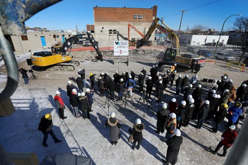 RUTH BONNEVILLE / WINNIPEG FREE PRESS



People gather to view the backhoes breaking ground on the grounds of Siloam Mission Monday morning for the  $19 million Expansion of their homeless  Shelter.
 
The 54,300 square foot building will create 50 additional shelter beds and more space for Siloams health services, mental health supports and transition services to meet the growing demand of people experiencing homelessness.
See story. 

FEB 12/2018

