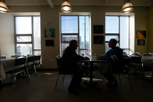 JOHN WOODS / WINNIPEG FREE PRESS
See Burrows (R) and Charles Husband, co-chairs of the Rail Yard Relocation Project (RYRP), meet at the Neechi Commons Monday, February 12, 2018. RYRP wants to start investigating moving Winnipeg's rail yards out of the city.