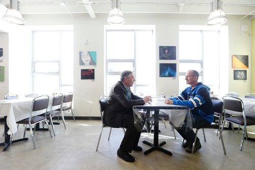 JOHN WOODS / WINNIPEG FREE PRESS
See Burrows (R) and Charles Husband, co-chairs of the Rail Yard Relocation Project (RYRP), meet at the Neechi Commons Monday, February 12, 2018. RYRP wants to start investigating moving Winnipeg's rail yards out of the city.