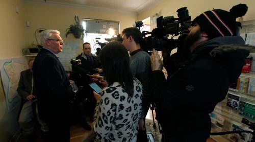 PHIL HOSSACK / Winnipeg Free Press - Former NDP Premier Greg Selinger is hemmed in by media scrumming at a press conference called at his consituency office Tuesday morning. See Nick Martin Story.-  February 13, 2018
