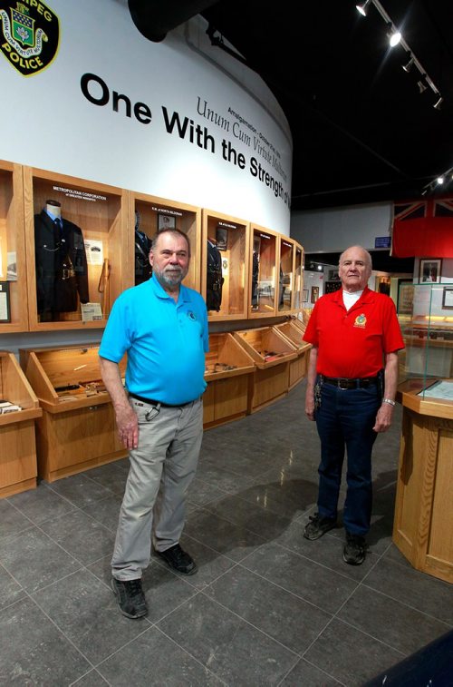 BORIS MINKEVICH / WINNIPEG FREE PRESS
The Winnipeg Police Museum at the new Police Headquarters. From left, Police historians Randy James and Jack Templeman pose for a photo in the museum. BILL REDEKOP STORY Feb. 13, 2018