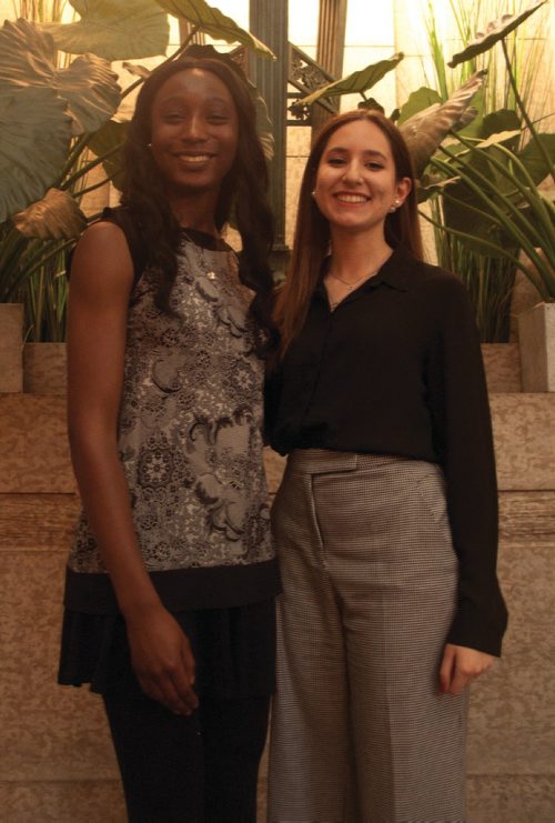 Canstar Community News Portage Collegiate's Tee-Tee Appah (left) and Kildonan East Collegiate's Giorgia Di Tria were among six students from across Manitoba who took part in the Manitoba Council for International Cooperation's Voices for Change program this year. The six students spent four days learning about international development and spoken word poetry, and wrote a collaborative piece titled "Shaping Us", which they performed at the Manitoba Legislature on Feb. 6. (SHELDON BIRNIE/CANSTAR/THE HERALD)